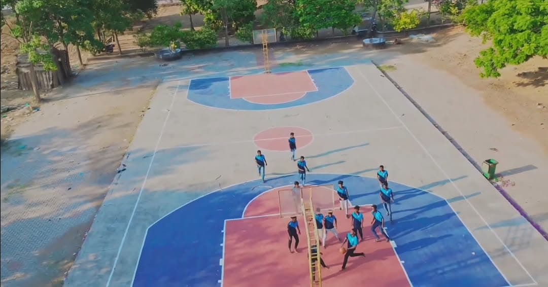 An aerial view of students playing on the SVPP sports court